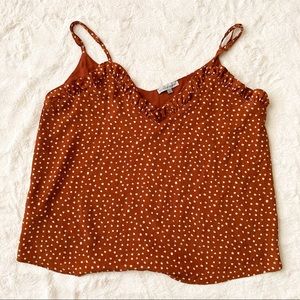 Polka dot cami with ruffled neckline